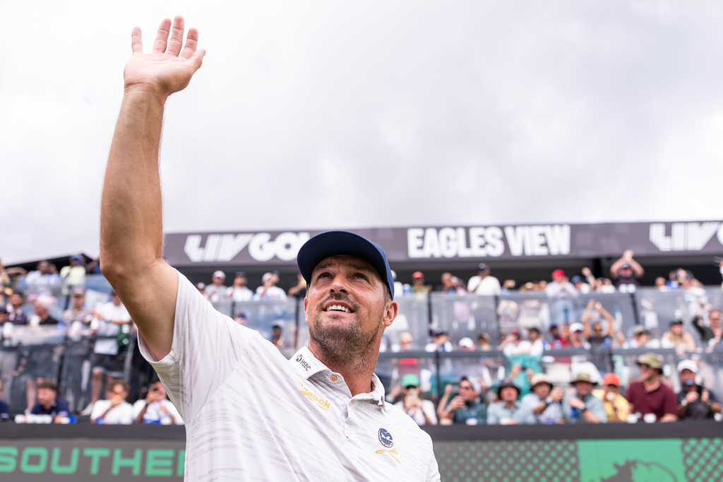 FILE - Captain Bryson DeChambeau, of Crushers GC, waves to the fans at the 17th tee during the third round of LIV Golf South Africa at The Club at Steyn City, Saturday, March 21, 2026 in Midrand, South Africa. (Pedro Salado/LIV Golf via AP, File)