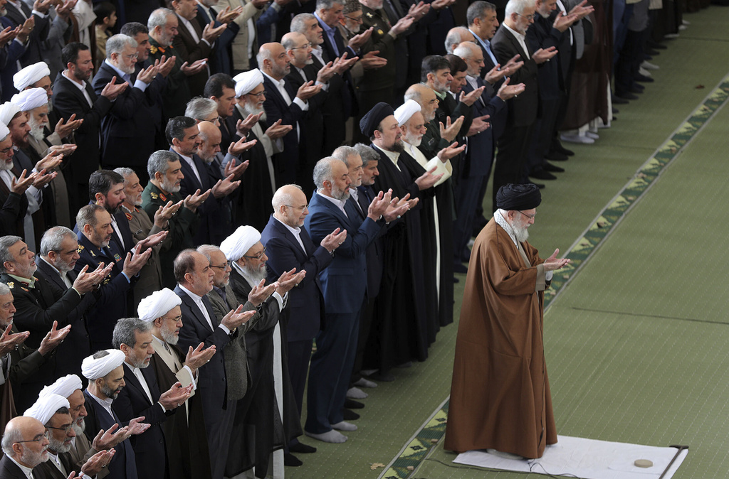 FILE - In this photo released by the official website of the office of the Iranian supreme leader, Supreme Leader Ayatollah Ali Khamenei leads an Eid al-Fitr prayer marking the end of the Muslim holy fasting month of Ramadan at the Imam Khomeini Grand Mosque in Tehran, Iran, Monday, March 31, 2025. (Office of the Iranian Supreme Leader via AP, File)