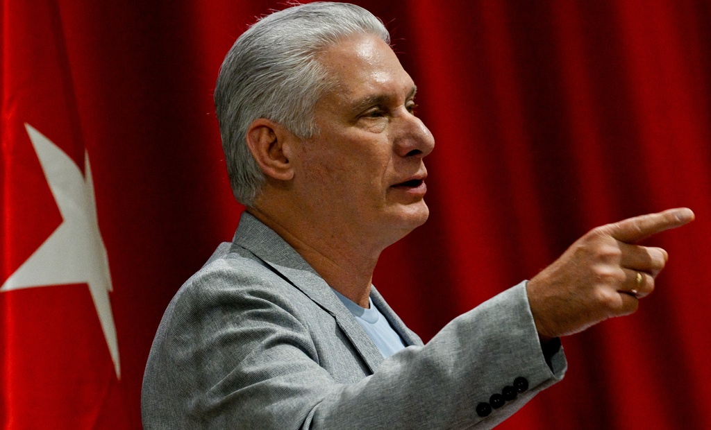 Cuban President Miguel Diaz-Canel delivers a welcome speech to participants of the "Nuestra America," or Our America Convoy at the Convention Palace in Havana, Cuba, Friday, March 20, 2026.(Adalberto Roque/Pool Photo via AP)