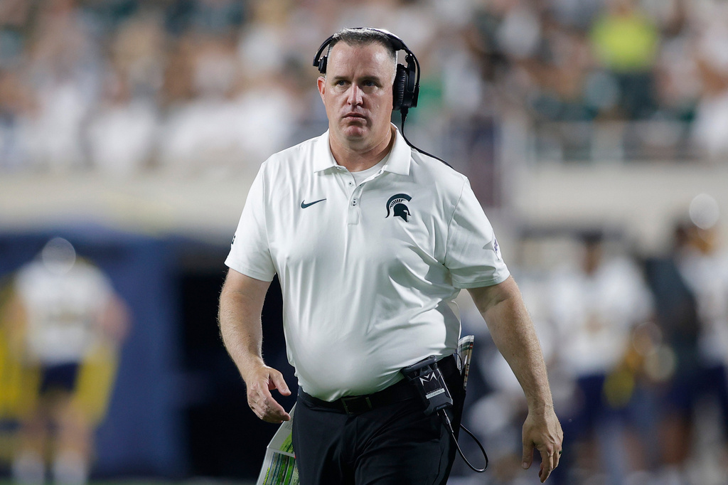 FILE - Michigan State head coach Pat Fitzgerald walks the sideline during an NCAA college football game, Sept. 4, 2026, in East Lansing, Mich. (AP Photo/Al Goldis, File)