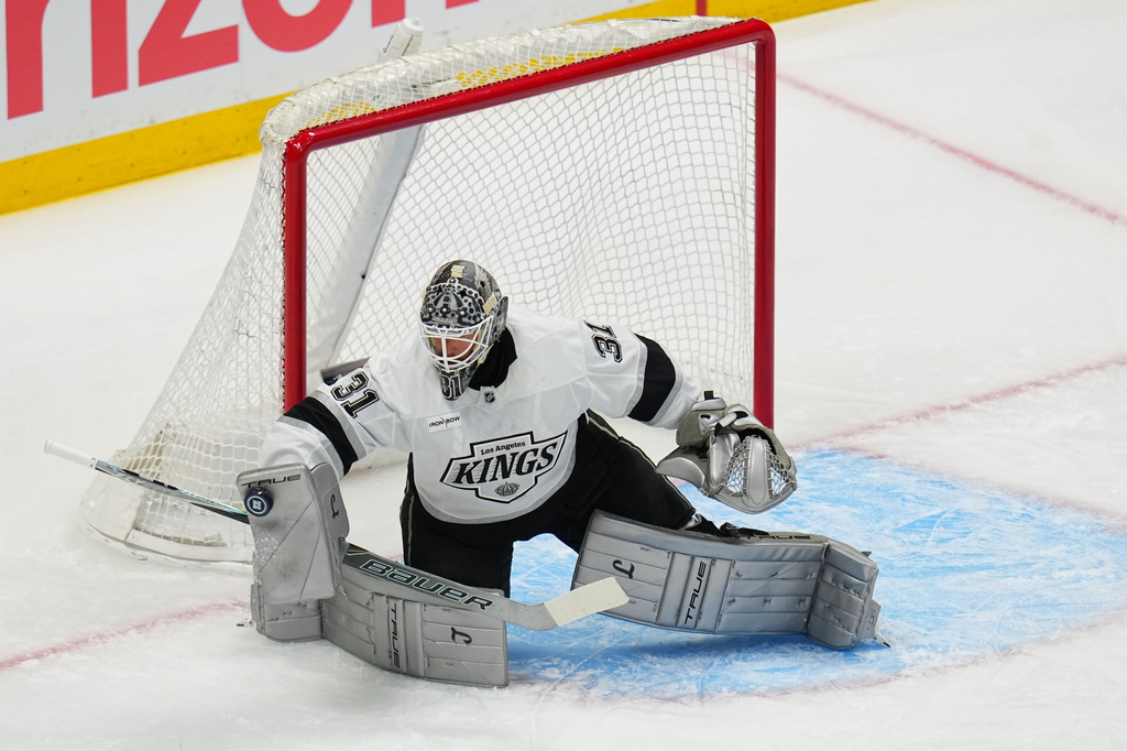 Los Angeles Kings goaltender Anton Forsberg makes a save against the Colorado Avalanche during the first period of Game 1 in the first round of the NHL hockey Stanley Cup playoffs, Sunday, April 19, 2026, in Denver. (AP Photo Jack Dempsey)