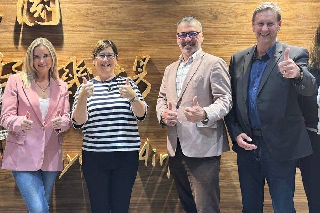 In this image supplied by the Taiwan Ministry of Foreign Affairs (MOFA), New Zealand lawmakers from left, Laura McClure, Maureen Pugh, Duncan Webb and David Wilson gesture as they pose for a photo at Taiwan Taoyuan International Airport, on May 4, 2026. (Taiwan MOFA via AP)