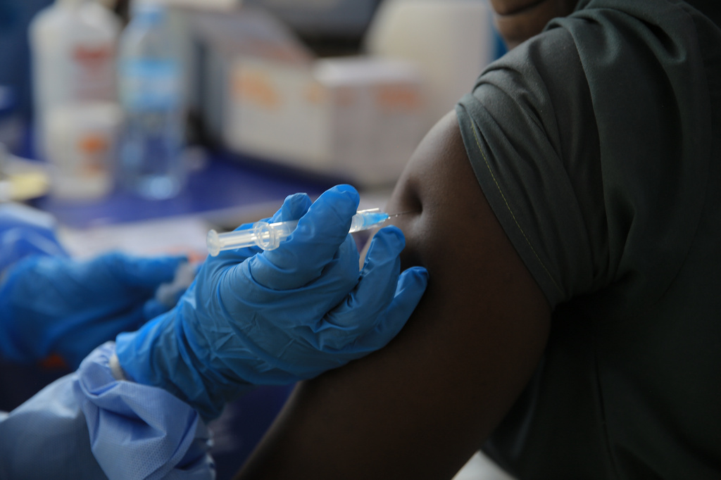 A health care worker administers a dose of Ervebo vaccine against the Ebola virus in Beni, North Kivu province, eastern Congo, Friday, Oct. 16, 2026. (AP Photo/Sebastien Kitsa Musayi)