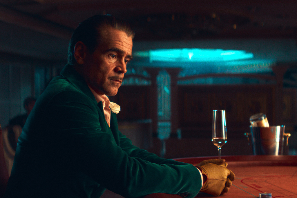 This image released by Netflix shows Colin Farrell in a scene from "Ballad of a Small Player." (Netflix via AP)