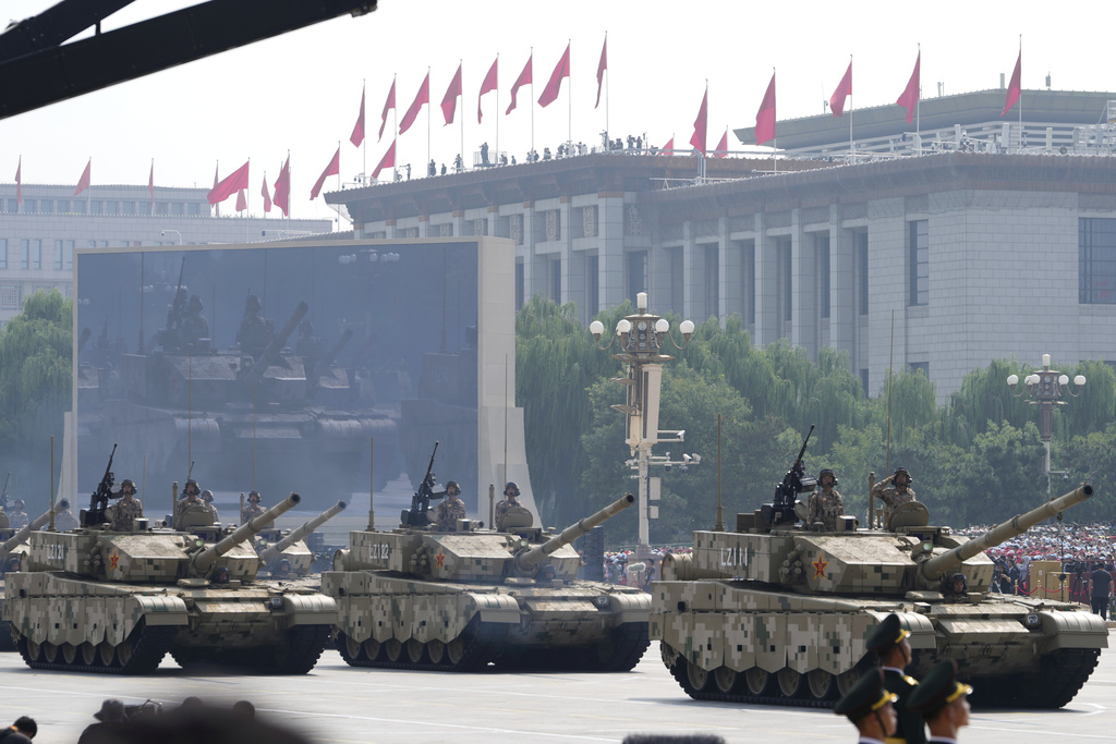 Armoured vehicles take part in a military parade to commemorate the 80th anniversary of Japan's World War II surrender held in front of Tiananmen Gate in Beijing, Wednesday, Sept. 3, 2025. (AP Photo/Ng Han Guan)