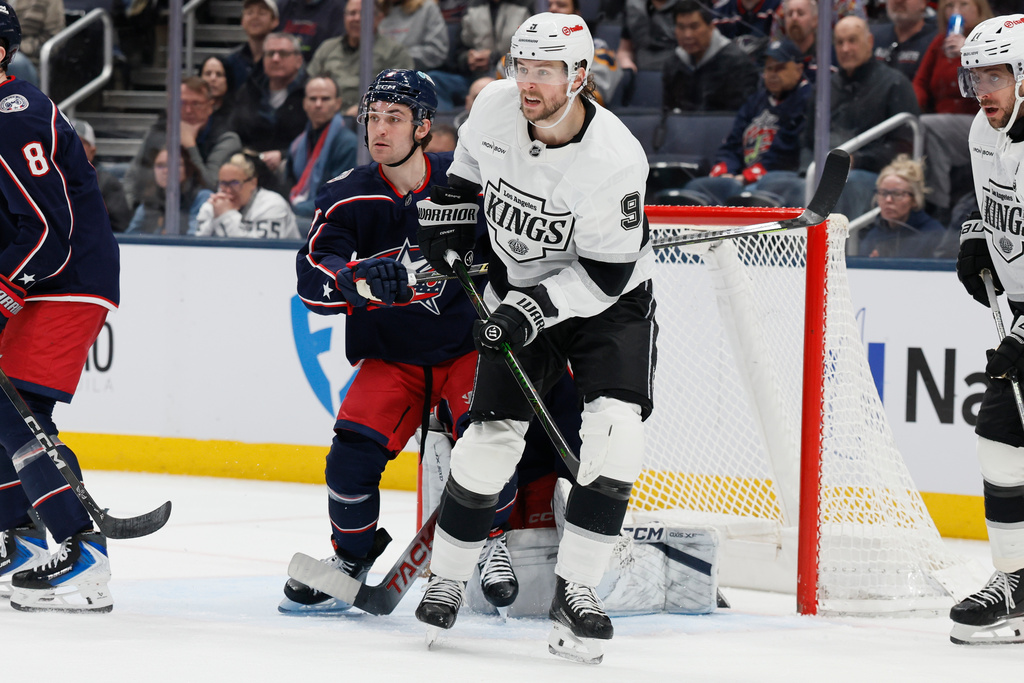 Columbus Blue Jackets' Denton Mateychuk, left, and Los Angeles Kings' Adrian Kempe jockey for position in front of the net during the second period of an NHL hockey game, Monday, March 9, 2026, in Columbus, Ohio. (AP Photo/Jay LaPrete)