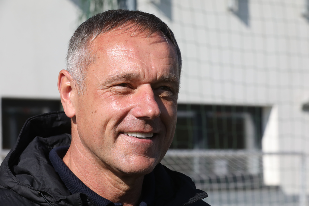 FILE - Ludek Miklosko, a board member of the Ban&iacute;k Ostrava football club, watches a training session led by new head coach Pavel Hapal in Ostrava, Czech Republic, Oct. 12, 2022. (Sznapka Petr/CTK via AP, File)