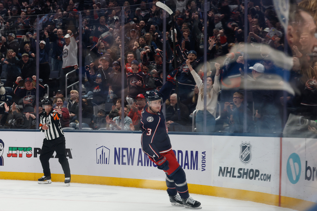 Columbus Blue Jackets' Charlie Coyle celebrates his goal against the Boston Bruins during the first period of an NHL hockey game, Sunday, March 29, 2026, in Columbus, Ohio. (AP Photo/Jay LaPrete)