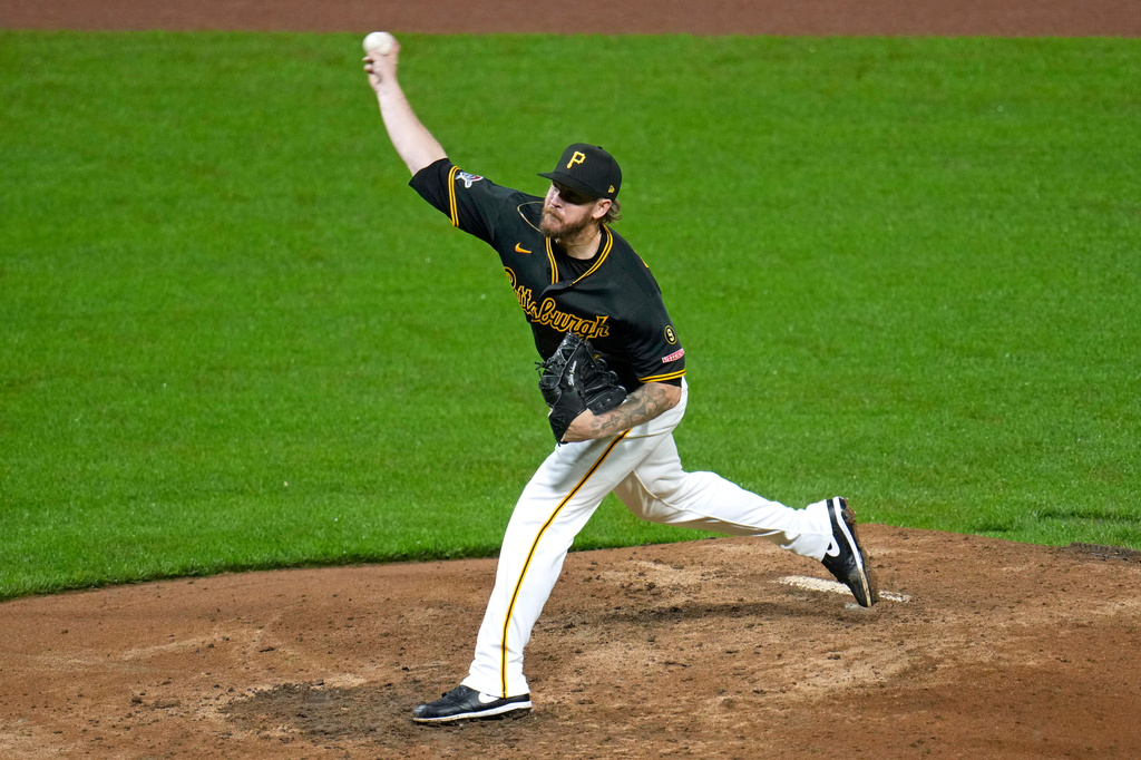 Pittsburgh Pirates pitcher Chris Devenski delivers during the seventh inning of a baseball game against the St. Louis Cardinals in Pittsburgh, Wednesday, April 29, 2026. (AP Photo/Gene J. Puskar)