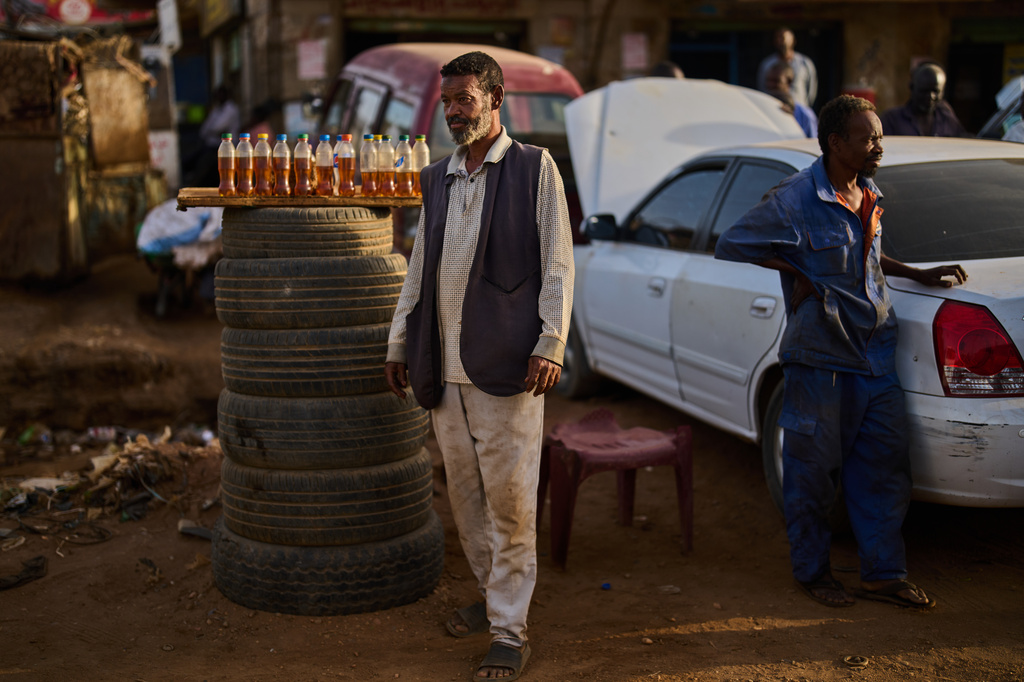 A street vendor sells fuel in Omdurman, Sudan, on the outskirts of Khartoum, Tuesday, April 21, 2026. (AP Photo/Bernat Armangue)
