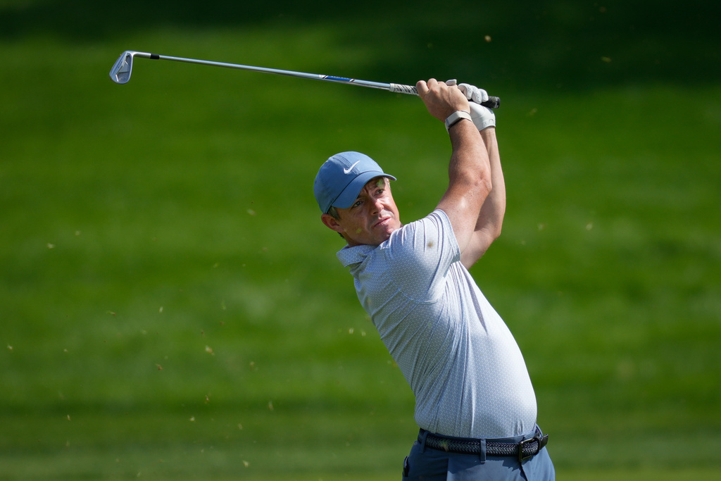 Rory McIlroy of Northern Ireland plays his second shot on the 9th hole during third round of the Dubai Desert Classic in United Arab Emirates, Saturday, Jan. 24, 2026. (AP Photo/Altaf Qadri)