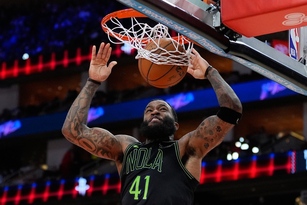 New Orleans Pelicans guard Saddiq Bey dunks during the first half of an NBA basketball game against the Houston Rockets in Houston, Sunday, Jan. 18, 2026. (AP Photo/Ashley Landis)