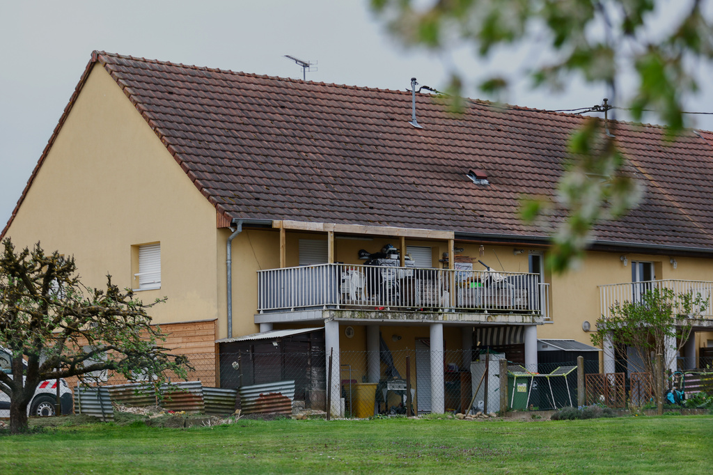 Outside view of the building where a 9-year-old boy was rescued this week after living locked in his father's utility van since 2024, in Hagenbach, Eastern France, Saturday, April 11, 2026. (AP Photo)