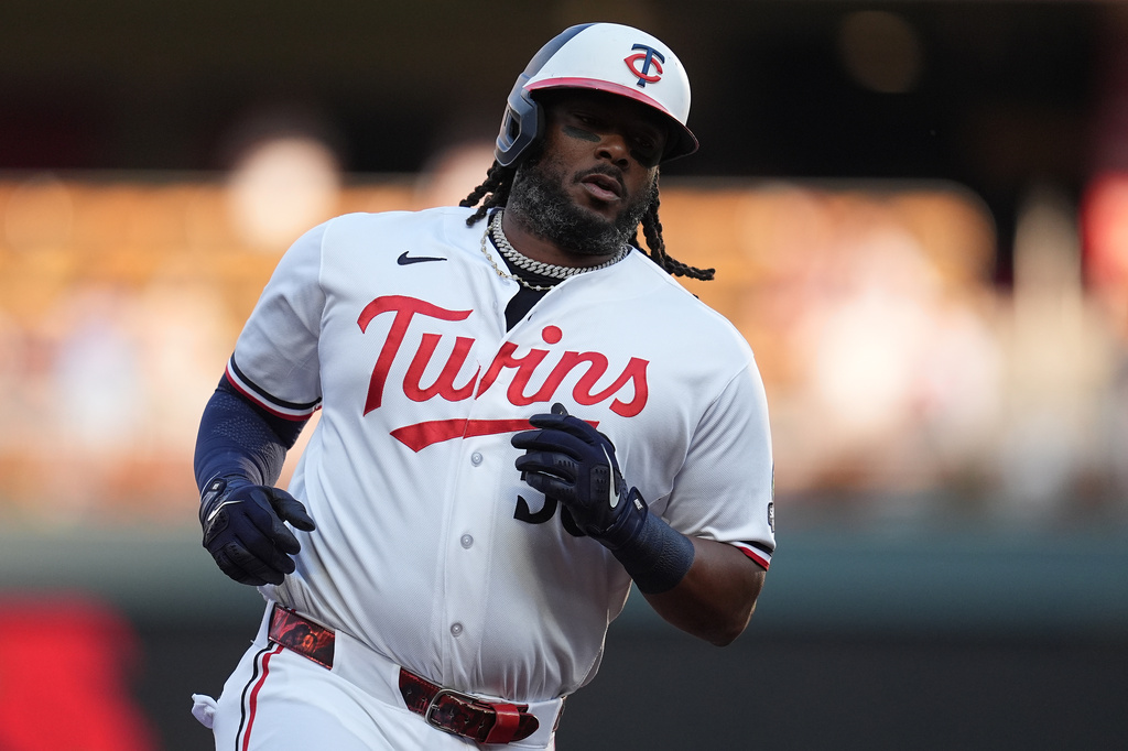 Minnesota Twins' Josh Bell runs the bases after hitting a two-run home run during the first inning of a baseball game against the Atlanta Braves Tuesday, Aug. 18, 2026, in Minneapolis. (AP Photo/Abbie Parr)