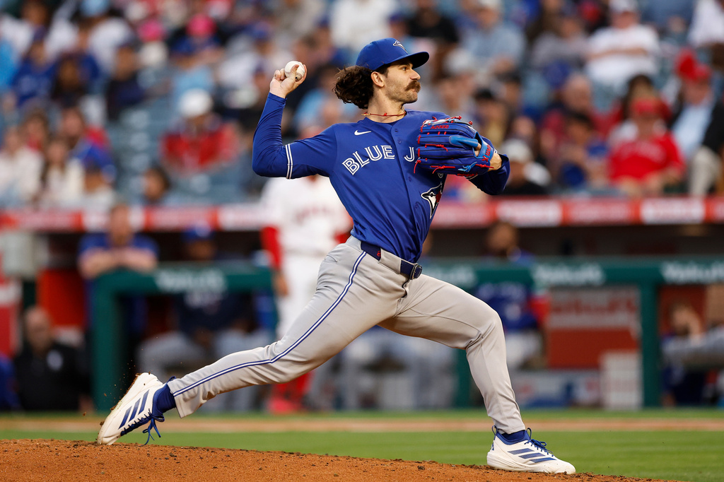 Toronto Blue Jays starting pitcher Dylan Cease delivers during the second inning of a baseball game against the Los Angeles Angels, Monday, April 20, 2026, in Anaheim, Calif. (AP Photo/Caroline Brehman)