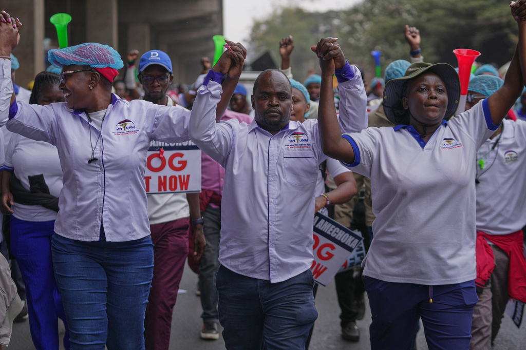 Kenyan nurses and other health workers demonstrate over low pay in Nairobi, Kenya Tuesday, Sept. 8, 2026. (AP Photo/Brian Inganga)