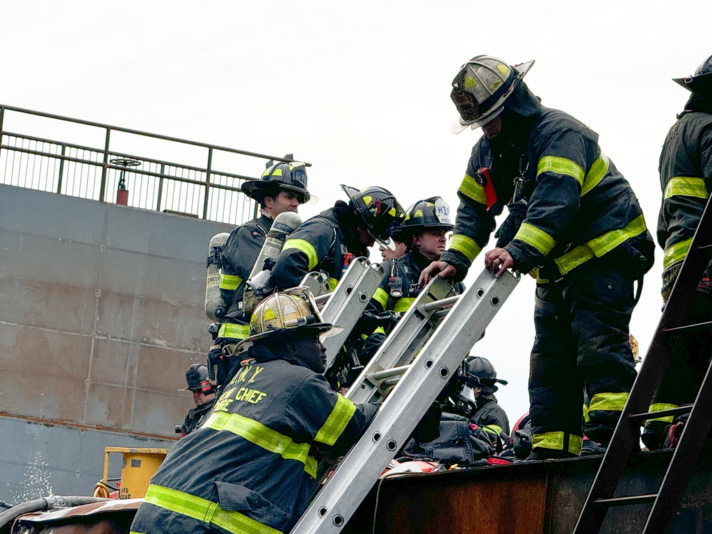 Firefighters respond to an explosion at a shipyard in Staten Island on Friday, May 22, 2026 in New York. (Staten Island Advance via AP)