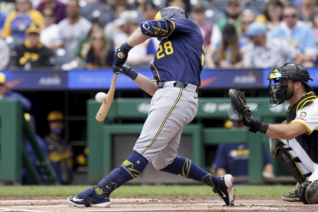 Milwaukee Brewers' Andrew Vaughn hits an RBI single during the first inning of a baseball game against the Pittsburgh Pirates, Sunday, Sept. 7, 2025, in Pittsburgh. (AP Photo/Matt Freed)