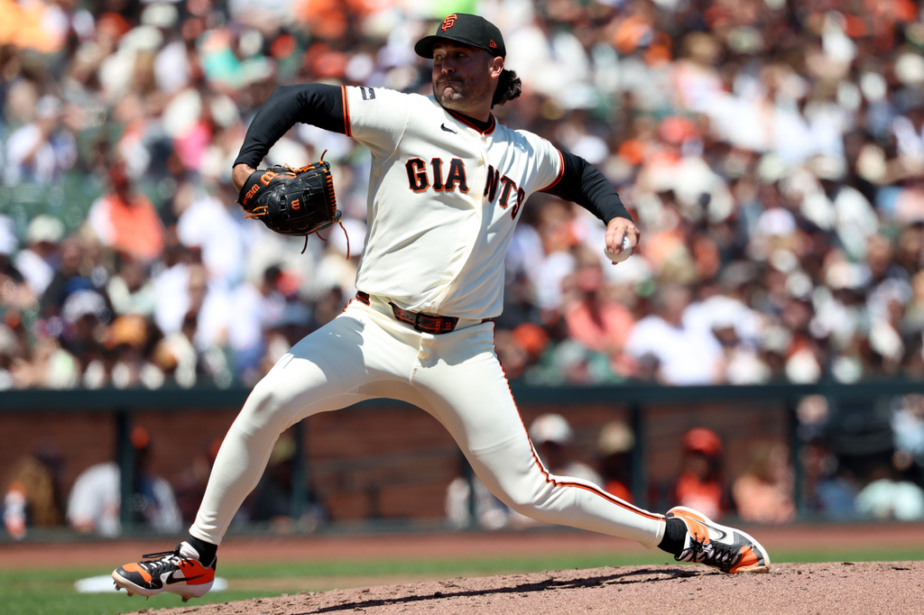 San Francisco Giants pitcher Robbie Ray throws during the third inning of a baseball game against the Chicago White Sox in San Francisco, Sunday, May 24, 2026. (AP Photo/Jed Jacobsohn)