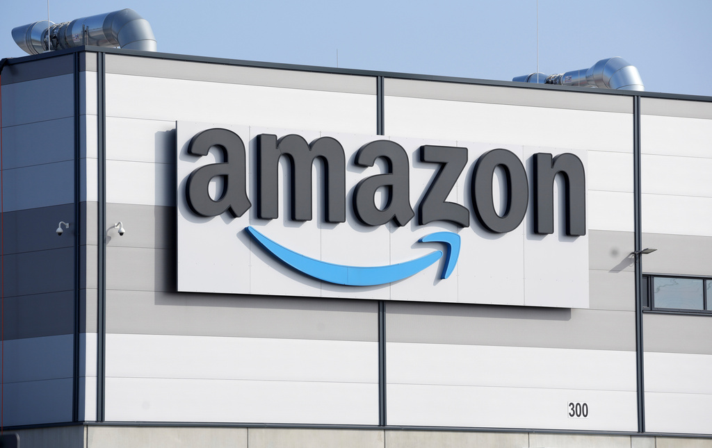 FILE - An Amazon company logo marks the facade of a building, March 18, 2022, in Schoenefeld near Berlin. (AP Photo/Michael Sohn, File)