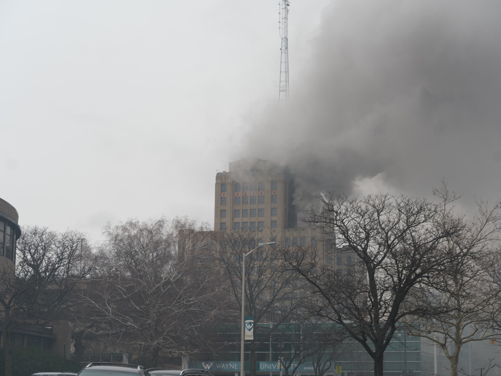 CORRECTS BYLINE TO JOHN GROVER, NOT COREY WILLIAMS - In this photo provided by the Detroit Fire Department, firefighters work to extinguish a fire at the Maccabees Building on the Wayne State University campus in Detroit on Wednesday, April 1, 2026. (John Grover/Detroit Fire Department via AP)