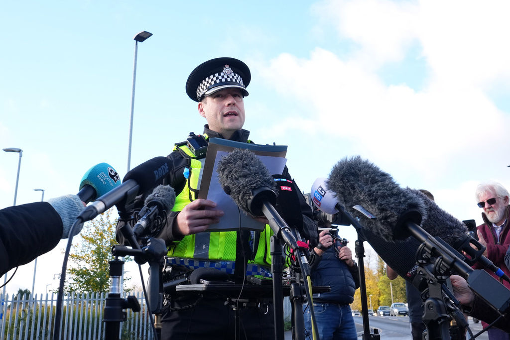 Police Superintendent John Loveless addresses the media after a mass stabbing on a London-bound train in Huntingdon, England, Sunday, Nov. 2, 2025.(AP Photo/Kirsty Wigglesworth)