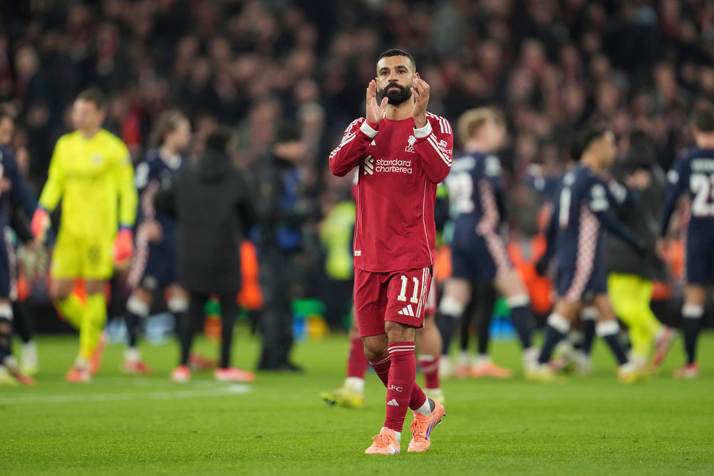 Liverpool's Mohamed Salah applauds after the Champions League opening phase soccer match between Liverpool and PSV in Liverpool, England, Wednesday, Nov. 26, 2025. (AP Photo/Jon Super)