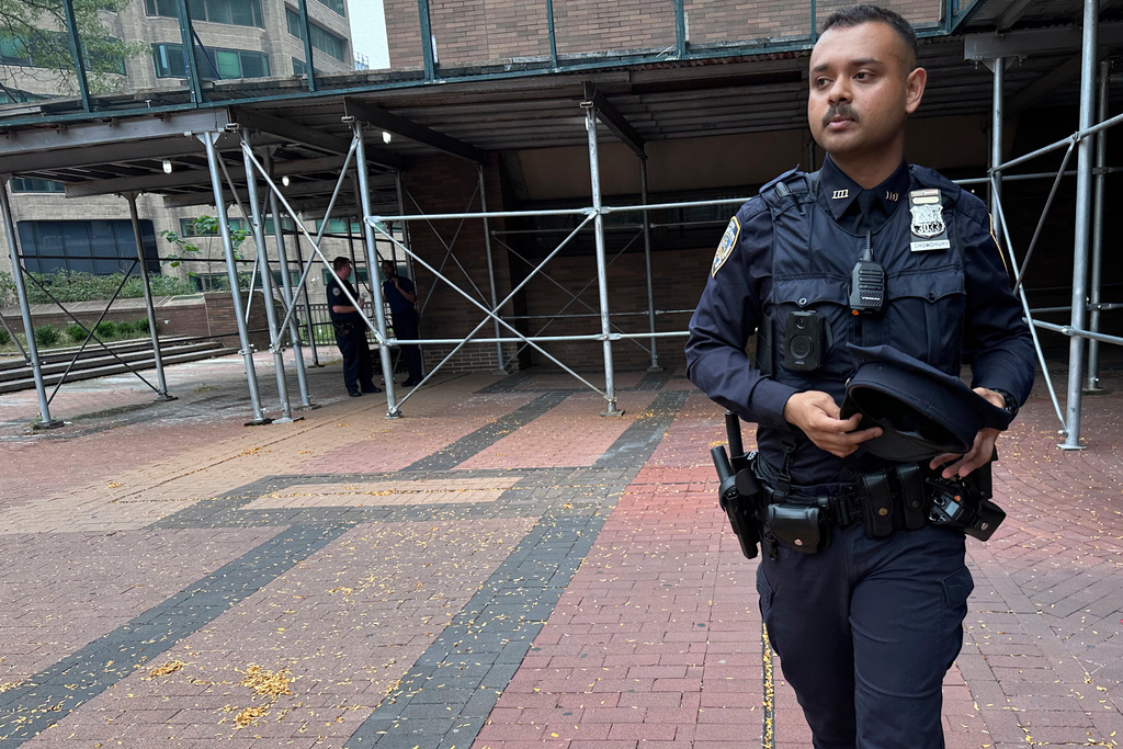 New York Police Department Officer Ishmam Chowdhury stands outside police headquarters in the Manhattan borough of New York on Wednesday, Aug. 6, 2025. (AP Photo/Philip Marcelo)