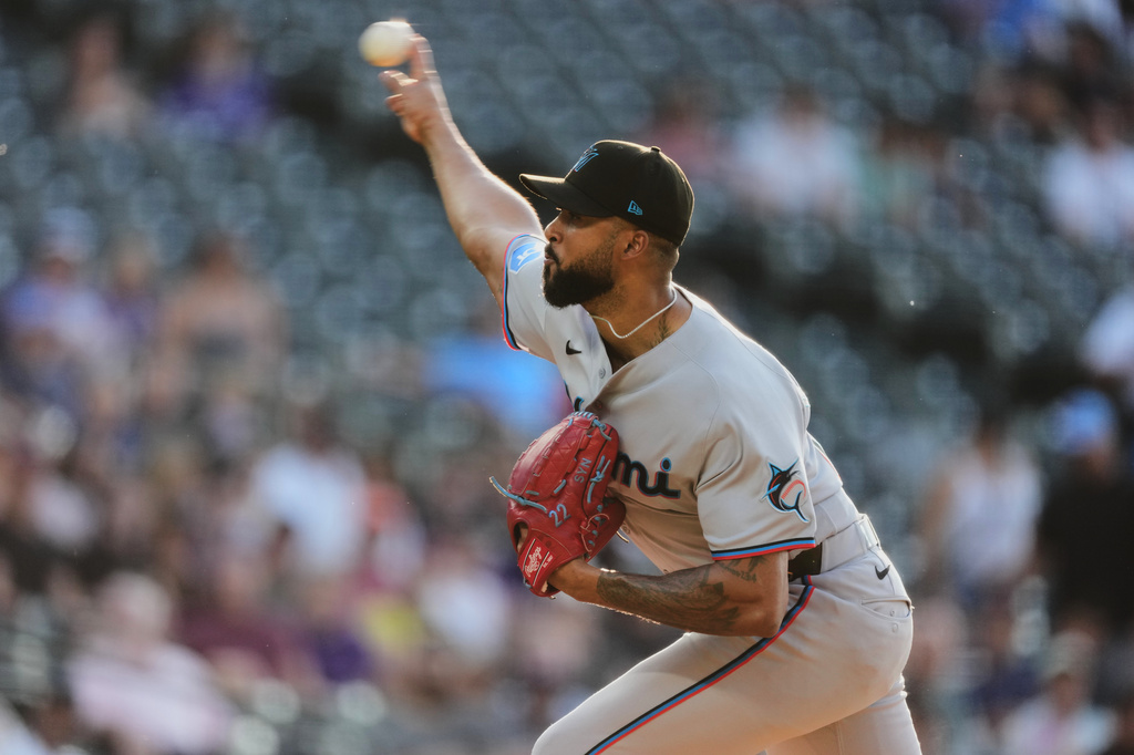 Miami Marlins starting pitcher Sandy Alcantara works against the Colorado Rockies in the first inning of a baseball game Monday, June 29, 2026, in Denver. (AP Photo/David Zalubowski)