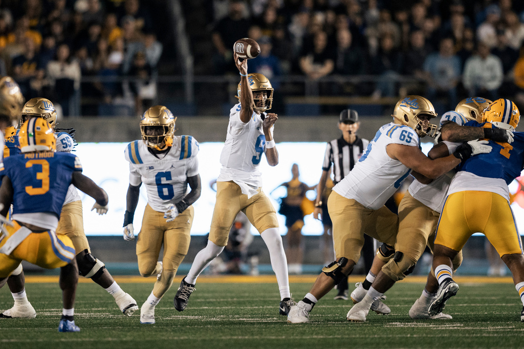 UCLA quarterback Nico Iamaleava (9) makes a throw during the first half of an NCAA football game against California in Berkeley, Calif., on Saturday, Sept. 5, 2026. (Stephen Lam/San Francisco Chronicle via AP)