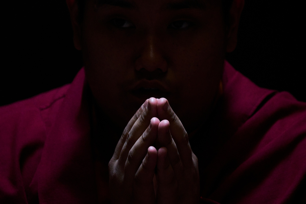 Jalue Dorje prays at Maratika Caves, 135 miles east from Kathmandu, Nepal, Monday, April 13, 2026. (AP Photo/Niranjan Shrestha)
