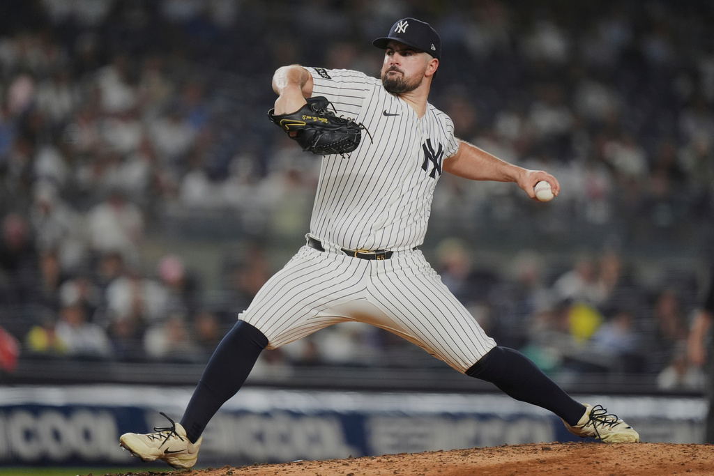 New York Yankees' Carlos Rodón pitches during the third inning of a baseball game against the Chicago White Sox Thursday, Sept. 25, 2025, in New York. (AP Photo/Frank Franklin II)