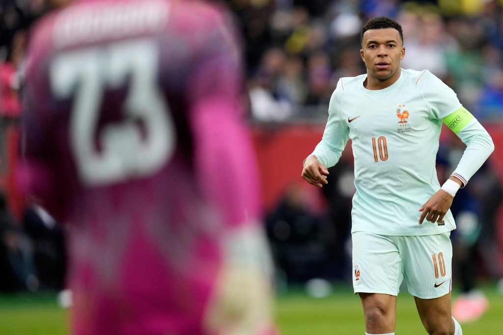 FILE - Kylian Mbappe of France runs during the international friendly soccer match between Brazil and France in Foxborough, Mass, March 26, 2026. (AP Photo/Charles Krupa, File)