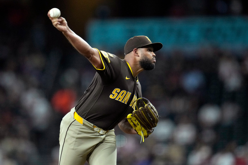 San Diego Padres starting pitcher Randy Vásquez throws against the Arizona Diamondbacks during the first inning of a baseball game, Tuesday, Aug. 4, 2026, in Phoenix. (AP Photo/Ross D. Franklin)
