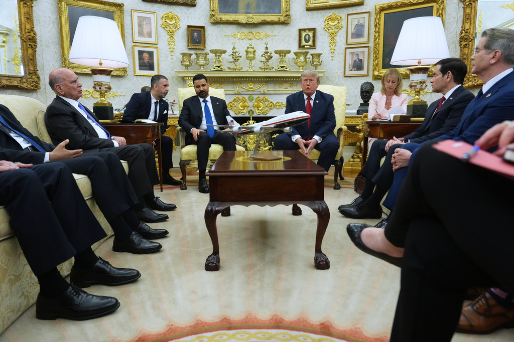 President Donald Trump meets with Iraq's Prime Minister Ali al-Zaidi in the Oval Office of the White House, Tuesday, July 14, 2026, in Washington. (AP Photo/Julia Demaree Nikhinson)