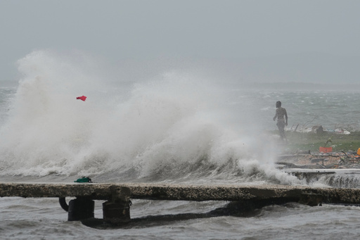 Waves splash in Kingston, Jamaica, as Hurricane Melissa approaches, Tuesday, Oct. 28, 2025. (AP Photo/Matias Delacroix) Waves splash in Kingston, Jamaica, as Hurricane Melissa approaches, Tuesday, Oct. 28, 2025. (AP Photo/Matias Delacroix)