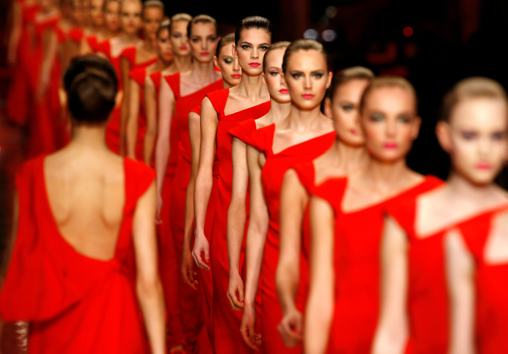 FILE - Models take to the runway after the presentation of Italian fashion designer Valentino's Haute Couture Spring-Summer 2008 collection, in Paris, Jan. 23, 2008. (AP Photo/Jacques Brinon, File)