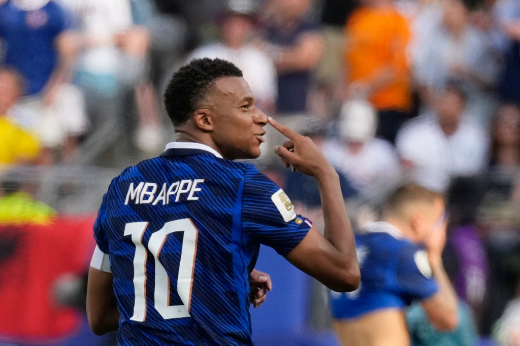 France's Kylian Mbappe reacts after scoring his side's opening goal during the World Cup round of 32 soccer match between France and Sweden in East Rutherford, N.J., near New York, Tuesday, June 30, 2026. (AP Photo/Seth Wenig)