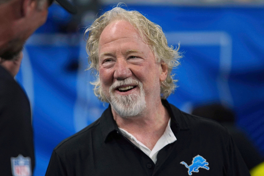 FILE - Actor Timothy Busfield smiles before an NFL football game in Detroit, Sept. 14, 2025. (AP Photo/Paul Sancya, File)