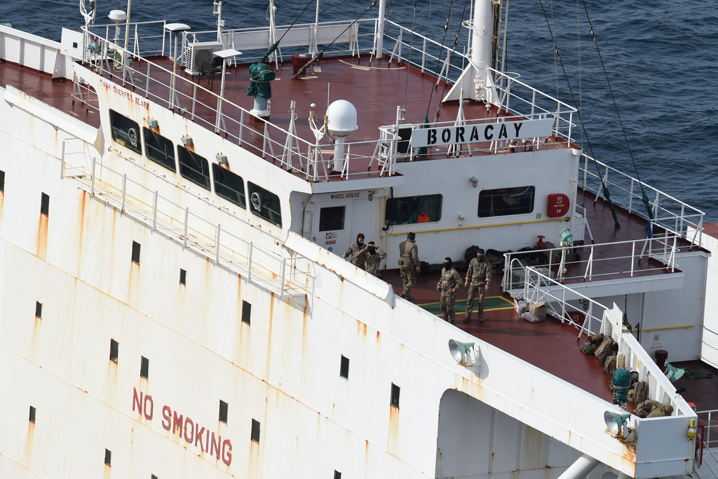 Soldiers stand on the deck on the tanker Boracay that allegedly belongs to Russia's so-called shadow fleet, Thursday, Oct. 2, 2025, off Saint-Nazaire, France's Atlantic coast. (AP Photo/Mathieu Pattier)