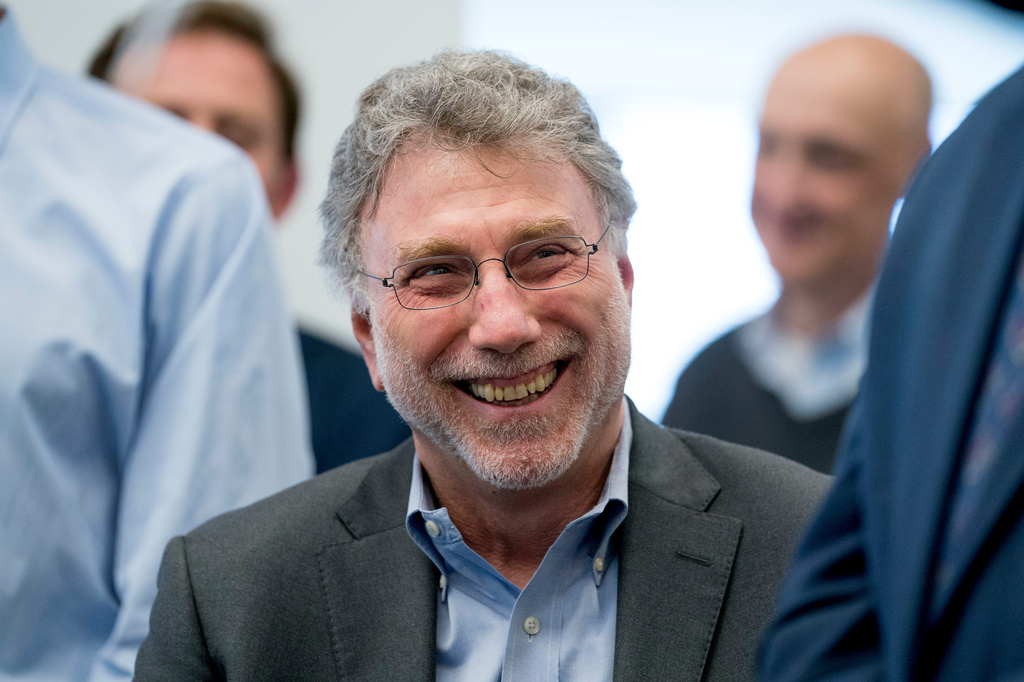 FILE - Washington Post Executive Editor Marty Baron smiles in the newsroom in Washington on April 16, 2018, as the newspaper wins two Pulitzer prizes. (AP Photo/Andrew Harnik, File)
