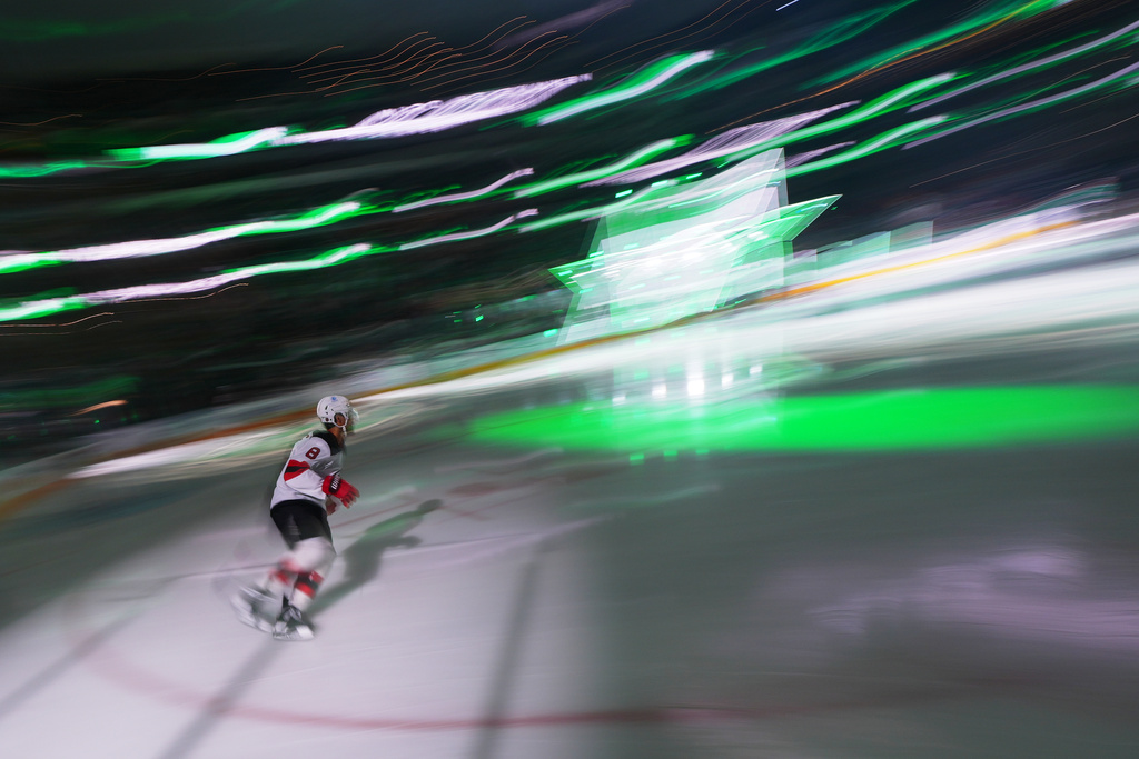 New Jersey Devils defenseman Johnathan Kovacevic takes the ice prior to an NHL hockey game against the Dallas Stars Tuesday, March 24, 2026, in Dallas. (AP Photo/Julio Cortez)