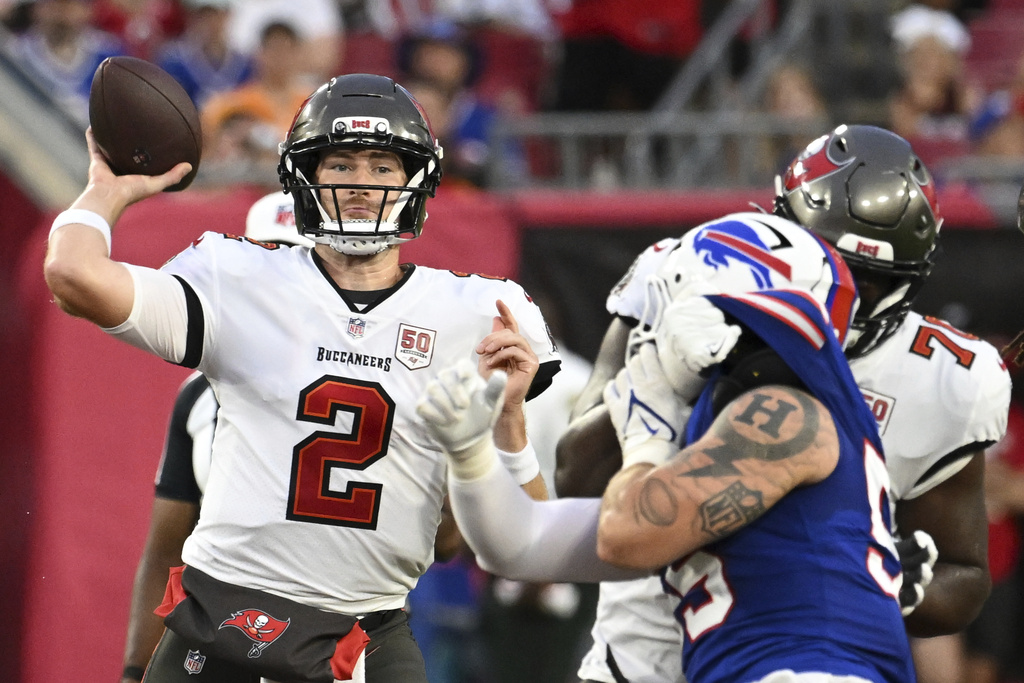 Tampa Bay Buccaneers quarterback Kyle Trask passes against the Buffalo Bills during the first half of an NFL preseason football game, Saturday, Aug. 23, 2025, in Tampa, Fla. (AP Photo/Jason Behnken)