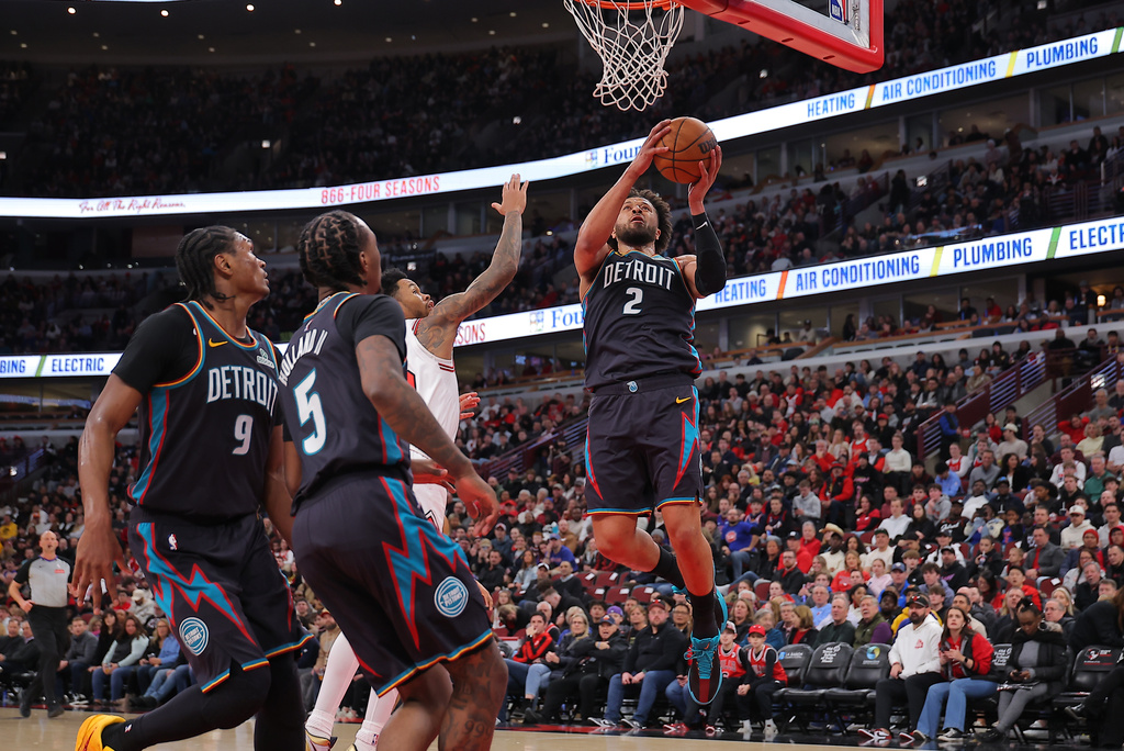 Detroit Pistons guard Cade Cunningham (2) drives to the basket for a layup during the first half of an NBA basketball game against the Chicago Bulls Saturday, Feb. 21, 2026, in Chicago. (AP Photo/Melissa Tamez)