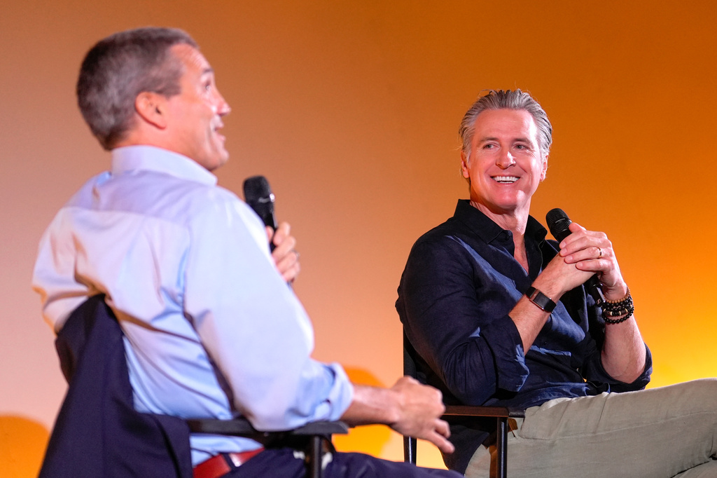California Gov. Gavin Newsom, right, discusses environmental issues with Wade Crowfoot, head of the California Natural Resources Agency in San Francisco, Tuesday, Sept. 29, 2026. (AP Photo/Rich Pedroncelli)