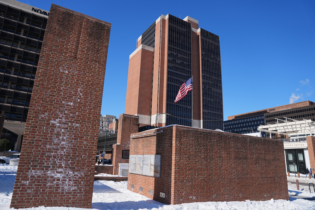 The Federal courthouse stands above the location of the now removed explanatory panels that were part of an exhibit on slavery at President's House Site in Philadelphia, Friday, Jan. 30, 2026. (AP Photo/Matt Rourke)