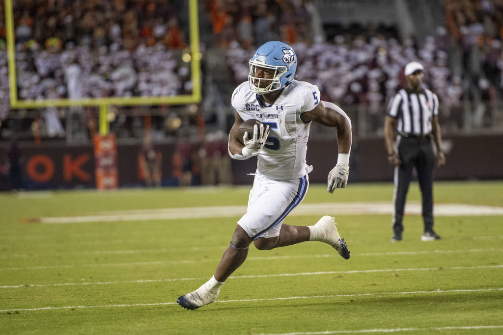 Old Dominion running back Maurki James (5) runs in for a touchdown against Virginia Tech during the first half of an NCAA college football game Saturday, Sept. 13, 2025, in Blacksburg, Va. (AP Photo/Robert Simmons)