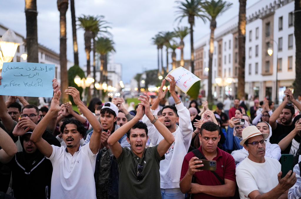 People take part in a youth-led protest against corruption and calling for education and healthcare reforms, in Rabat, Morocco, Thursday, Oct. 9, 2025. (AP Photo/Mosa'ab Elshamy)