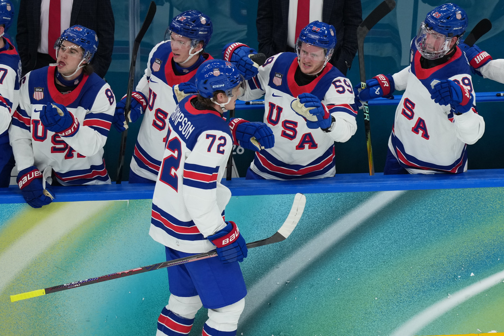 United States' Tage Thompson (72) is congratulated after scoring against Slovakia during the first period of a men's ice hockey semifinal game at the 2026 Winter Olympics in Milan, Italy, Friday, Feb. 20, 2026. (AP Photo/Carolyn Kaster)