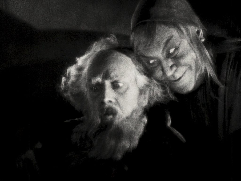 This image released by Kino Lorber shows Gösta Ekman, left, and Emil Jennings in a scene from the 1926 German film "Faust." (Kino Lorber via AP)